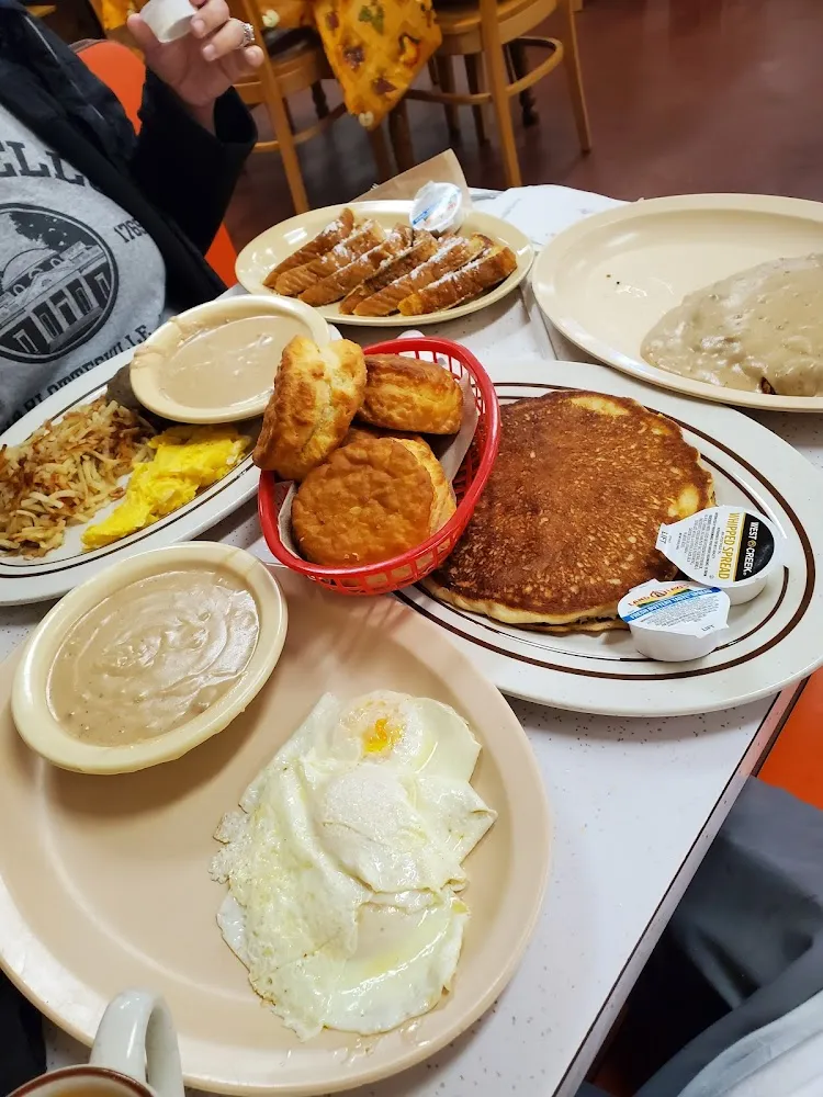 Eggs Home Fries Biscuit and Gravy and Pancakes