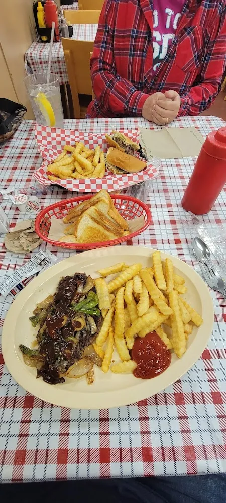 Hamburger Steak with Grilled Onions Green Peppers and Mushrooms